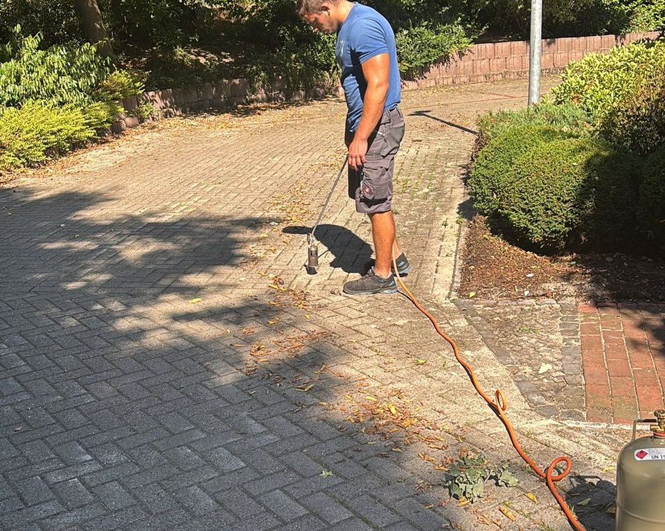 Hochdruckreinigung einer Pflasterfläche